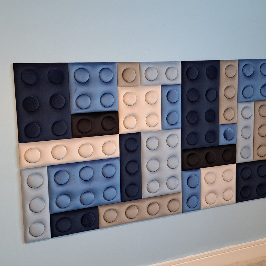 Upholstered Wall Panels with a pattern made of interlocking toy bricks in shades of blue