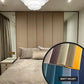 Modern bedroom with beige headboard and bed, featuring a close-up of Matt Velvet fabric swatch.