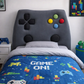 Bedroom with a gaming-themed upholstered kids headboard and quilt, featuring colourful buttons and 'Game On!' text.