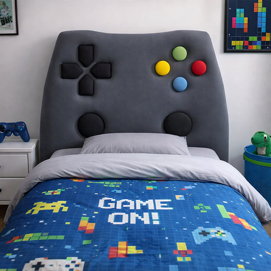 Bedroom with a gaming-themed upholstered kids headboard and quilt, featuring colourful buttons and 'Game On!' text.