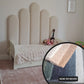 Children's bed with textured headboard and bedding, featuring a close-up of the fabric texture.
