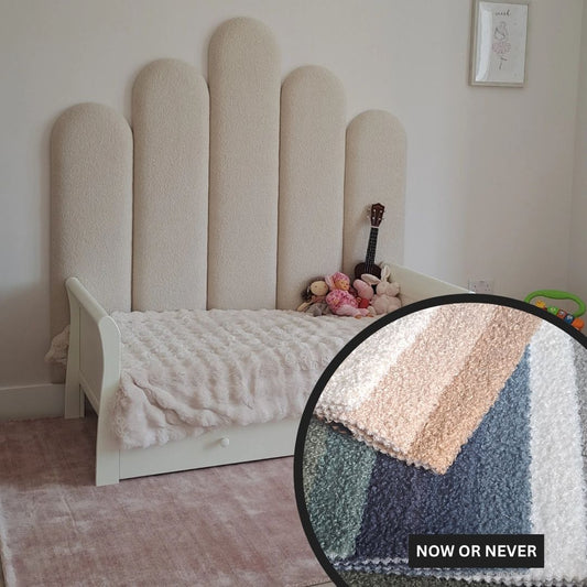 Children's bed with textured headboard and bedding, featuring a close-up of the fabric texture.