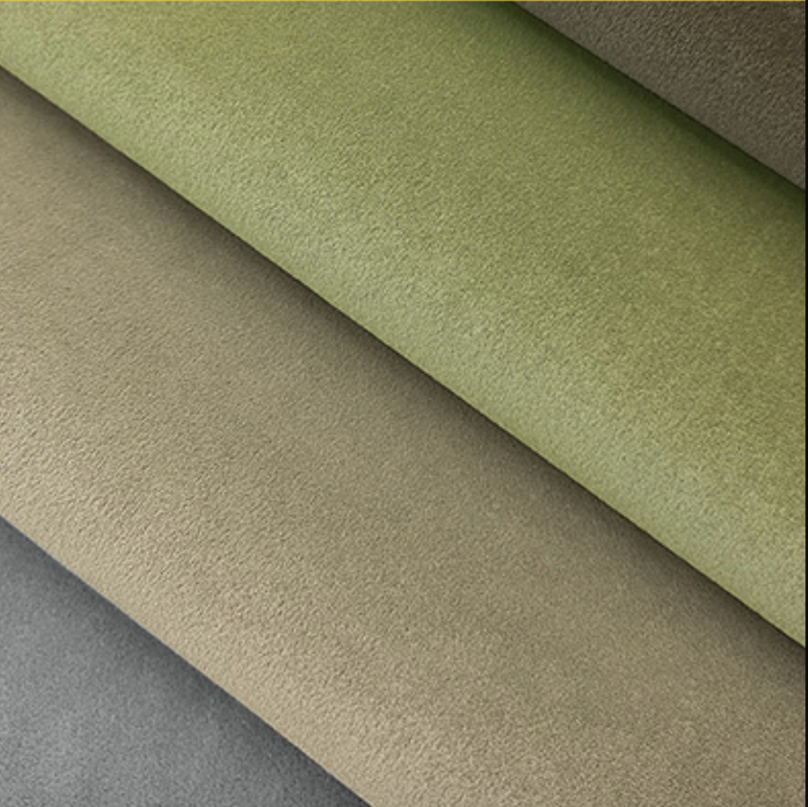 Swatches of fabric in green tones