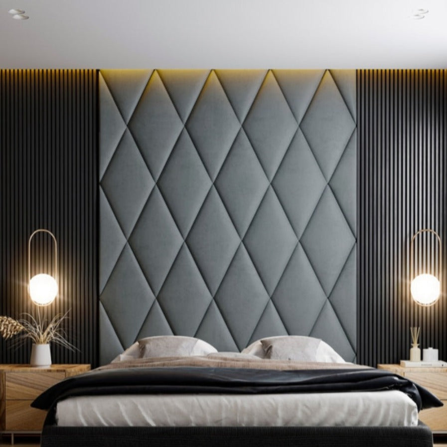 Diamond upholstered wall paneling in bedroom