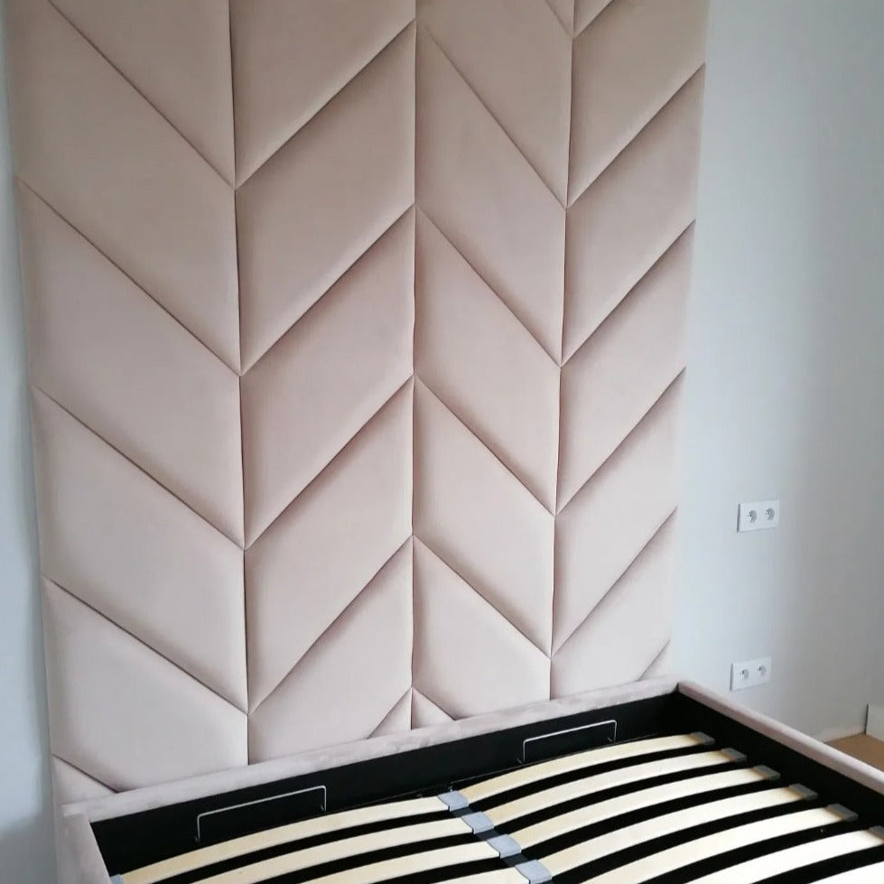 Herringbone wall paneling as headboard