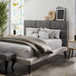Grey double upholstered wall paneling in bedroom