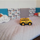 Children's wall panel around bed with car patterns