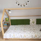 Children's wall paneling surrounding child's bed